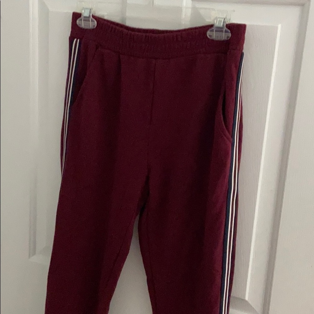 Maroon joggers with stripes down the side!